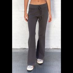 Soft Cotton Blend Tie Yoga Pants With A Big Flare Pant Leg. Fabrics: 100% Cotton Measurement: 10" (30 Cm) Rise, 34" (81 Cm) Inseam, 15" (66 Cm) Waist (Stretches) Made In: Italy Fitted Casual Cotton Wide Leg Pants, Fitted Cotton Wide Leg Casual Pants, Fitted Mid-rise Cotton Yoga Pants, Trendy Wide Leg Yoga Pants, Trendy Mid-rise Loungewear Pants, Trendy Mid-rise Pants For Loungewear, Cotton Wide Leg Pants For Yoga, Fitted Casual Wide Leg Pants For Loungewear, Fitted Wide Leg Casual Pants For Loungewear