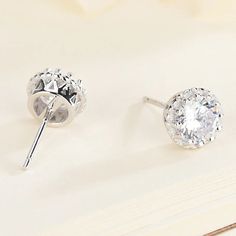 These stunning moissanite earrings feature a radiant round cut moissanite diamond surrounded by a halo of brilliance. Crafted as elegant moissanite stud earrings, they are a perfect choice for women’s earrings. With their dazzling moissanite diamonds, these jewelry earrings are a beautiful addition to any women’s jewelry collection. Enhance your look with these exquisite earrings moissanite. ✧ Main stone Carat Weight: 1.0ct*2pcs ✧ Stone Dimension: 6.5mm*2pcs ✧ Stone Shape: Round ✧ Enhancement: L Moissanite Halo Design Earrings, Moissanite Halo Earrings, Halo Stud Earrings, S Jewelry, Halo Earrings Studs, Moissanite Earrings, Moissanite Jewelry, Earring Crafts, Moissanite Diamonds