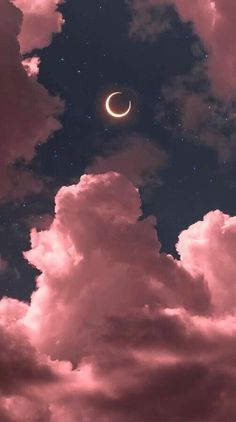 the moon is in the cloudy sky with clouds and stars around it, as well as some pink hues