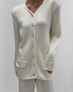 80s Vintage golden buttoned long cream cardigan. Excellent condition. True colors are cream with gold buttons. Material: 100% acrylic Recommend Fit: S-M/L depending on desired fit - see measurements  Tag Reads: C&A, size L Measurements Laid Flat:  Chest: 110cm, 43,3 Length: 77cm, 30,3 Sleeve: 64cm, 25,2 Styled on 5.7 ft (172 cm), usually dressed in size S. Please know all pieces are vintage and may show signs of pre-loved wear.  We do our best to note any flaws and hope you can appreciate each p Elegant Cream Sweater With Buttons, Cream Formal Cardigan For Fall, Formal Cream Cardigan For Fall, Classic White Cardigan With Buttons, Cream Formal Cardigan For Winter, Vintage Beige Cardigan For Work, Classic Cream Cardigan For Formal Occasions, Beige Vintage Cardigan For Work, Elegant Cream Sweater With Button Closure