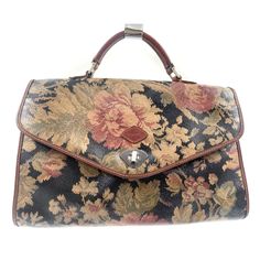 Vintage I Santi Luxurious Italian Tooled Floral Leather Doctor's Bag Satchel Handbag Made in Italy measurements: height: 9 inches length: 14 inches One of a kind vintage bag, floral leather details, the bag is lined with brown faux leather, one interior zipped pocket Bag is in good pre loved condition, one small crease on the flap please see pictures We had the bag professionally cleaned, leather polished and it is ready to be enjoyed Bargain at this price Vintage Brown Bags With Hasp Closure, Vintage Brown Bag With Hasp Closure, Vintage Satchel With Handle Drop, Vintage Bags With Hasp Closure For Everyday Use, Vintage Satchel With Detachable Strap And Tote Shape, Antique Brown Bags For Formal Occasions, Vintage Bucket Shoulder Bag With Removable Pouch, Vintage Tote Shoulder Bag With Detachable Strap, Vintage Shoulder Bag With Top Handle And Detachable Strap