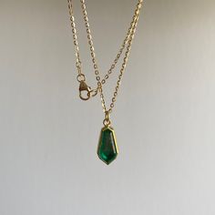 Grand verdant hues wash over this splendid emerald pendant. 22k, 18k yellow gold Emerald, 3.08 carats 1.5mm diamond cut chain is adjustable and can be worn at 17" and 20" Emerald Oval Pendant Necklace, Gold Emerald Pendant Necklace Hallmarked, Luxury Ethical Emerald Pendant Necklace, Oval Shape Emerald Pendant, 14k Yellow Gold Emerald-cut Emerald Necklace, Emerald Pendant, Colored Gems, Raw Crystal, Metal Art