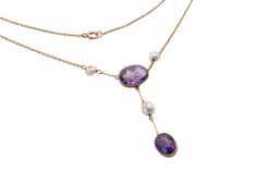 "A stunning Edwardian 15ct gold, amethyst and pearl necklace crafted in c.1900. This delightful piece features two deep purple bezel-set amethysts. The pearls are set either side of the amethysts which brings an element of true elegance. The deep, rich purple color of the amethysts is truly mesmerizing, creating a sense of glamour and allure that is impossible to ignore. Its timeless elegance and beauty make it a piece that will be cherished and worn for years to come, a true heirloom-quality pi