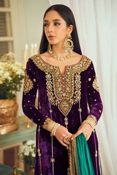 Purple Velvet Salwar Kameez Pakistani Wedding Dresses in a hand-crafted velvet purple shirt with a round neck paired with raw silk salwar. Fast Shipping. Velvet Salwar Kameez, Velvet Salwar, Velvet Pakistani Dress, Salwar Kameez Pakistani, Sequence Embroidery, Velvet Dress Designs, High Fashion Women, Simple Pakistani Dresses, Pakistani Wedding Dresses