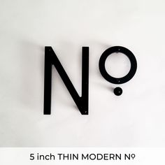 black THIN MODERN house numbers and No letters Single Number House Signs, Cheap Diy Curb Appeal, House Number Vertical, Oversized House Numbers, House Numbers Over Garage Door, Modern House Sign, Address Numbers On House Front Porches, House Address Ideas, House Number Placement