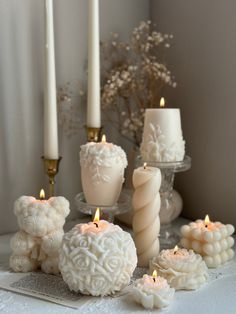 some candles are sitting on a table