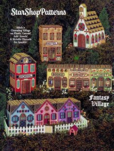 the front cover of a cross stitch pattern book, with several small houses in different colors