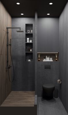 a bathroom with a toilet, shower and shelves on the wall next to each other