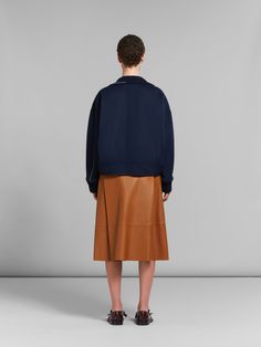 Double-face jacket crafted from lightweight wool and cashmere. Knitted collar and cuffs. Relaxed silhouette with dropped shoulders and triple-button closure. Hand-stitched Marni mending with flower detail on the shoulders. Knitted Collar, Cashmere Jacket, Trim Jacket, Flower Detail, Blue Wool, Collar And Cuff, Deep Blue, Hand Stitching, Calf Leather