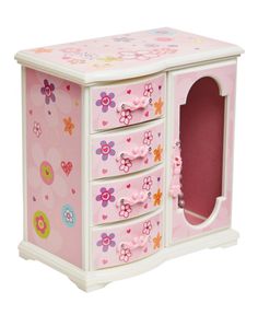 a toy chest with flowers and hearts painted on the sides, including an open door