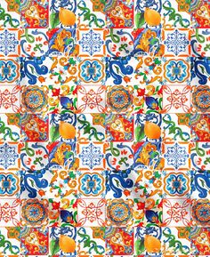 an artistic tile pattern with oranges and blue