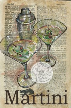 two martini glasses with olives in them on an old dictionary page