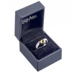 an open harry potter ring in a black box