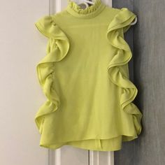 Neon Yellow Never Worn - Brand New Rich Material Ruffled Neck Top With Zipper And Small Button In The Back For Closing Trendy Tank Blouse For Spring, Trendy Spring Tank Blouse, Chic Green Blouse With Vest Detail, Yellow Sleeveless Blouse With Ruffles, Sleeveless Yellow Blouse With Ruffles, Chic Green Tank Blouse, Top With Zipper, Neon Yellow, Sleeveless Top