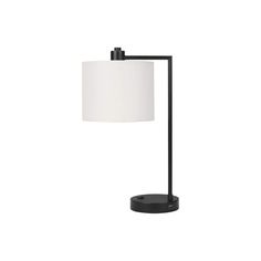 a black table lamp with a white shade on the base and a round light fixture