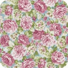 a pink and green floral pattern on fabric