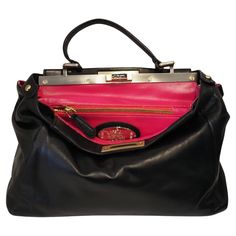 Fendi peekaboo black fucsia leather multitone hardware shoulder or handle bag Totally made in italy in a black leather outside, fucsia leather inside with hardware black gold and silver comes with shoulder strap so can easily be worn in two different ways Selleria logo in 925% real silver in the inside Fendi Pink Horsehair Bag, Fendi Peekaboo Bag, Peekaboo Bag, Chanel 2014, Pochette Louis Vuitton, Fendi Shoulder Bag, Pink Shoulder Bag, Chanel Flap Bag, It Bag