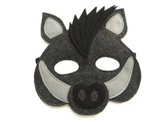 a black and white mask with horns on it's face is featured in this advertisement