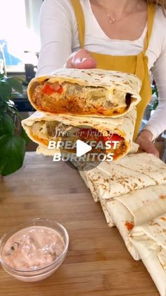 Sarah Bond on Instagram: "Comment 👉 "breakfast" and I'll send you the recipe!

These freezer breakfast burritos are the ultimate grab-and-go option, loaded with 21 grams of protein and veggies to kickstart your day 💪

Bonus: they’re freezer-friendly for up to 3 months and reheat like a dream 🌯❄️ 

We've been *obsessed* with these freezer burritos in our house for a few months now and I'm SO excited to finally share this new recipe with you!

🔗 https://www.liveeatlearn.com/freezer-breakfast-burritos/ #breakfastburritos #freezermealprep #freezerburritos #vegetarianburrito"