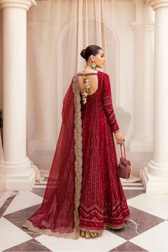 Elegant Deep Red embellished Pakistani Wedding Dress Frock Pishwas is exquisitely designed Embroidered Chickenkari chiffon Peshwas, masterfully crafted is a testament to timeless elegance and craftsmanship. From its rich embellishments to the intricately detailed neckline, every element speaks volumes of sophistication. This crimson ensemble is paired with an alluring Tinsel Organza dupatta, embroidered with exquisite Tilla borders, ensuring you captivate and enchant with every twirl and gaze. P Red Embellished Georgette Sharara, Red Embellished Georgette Dupatta, Red Embellished Georgette Anarkali Set, Red Organza Gown With Resham Embroidery, Elegant Red Gown With Intricate Embroidery, Red Designer Party Wear Gown, Red Party Wear Gown With Traditional Drape, Red Designer Party Dress, Red Organza Gown With Zari Work