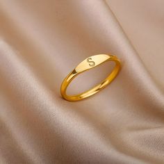 Simple Gold Engraved Promise Ring, Simple Everyday Engraved Gold Ring, Simple Gold Initial Ring For Anniversary, Simple Personalized Gold Stackable Rings, Minimalist Personalized Gold Stackable Rings, Personalized Minimalist Gold Stackable Rings, Minimalist Personalized Gold Engraved Ring, Trendy Gold Initial Ring For Anniversary, Trendy Gold Initial Open Ring