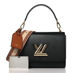 This is an authentic LOUIS VUITTON Epi Twist Top Handle Shoulder Bag MM in Black. This stylish shoulder bag is crafted of textured epi leather in black. The bag features a detachable leather top handle with gold hardware, an optional multicolored monogramed canvas strap, and a gold LV turn lock logo. This opens the bag to a black microfiber interior with patch pockets. Lock Logo, Oversized Bag, Twist Top, Versace Bags, Dior Jewelry, Stylish Shoulder Bag, Wallet Fashion, Hobo Handbags, Luxury Accessories