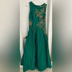 Size 38 Bust Anarkali Style Embellished Floor-length Evening Dress, Sleeveless Green Gown For Reception, Anarkali Evening Dress Maxi Length, Anarkali Evening Dress In Maxi Length, Anarkali Evening Gown, Festive Evening Dress With Sweep Train, Silk Maxi Gown For Reception, Silk Maxi Length Gown For Reception, Silk Fitted Maxi Dress For Reception