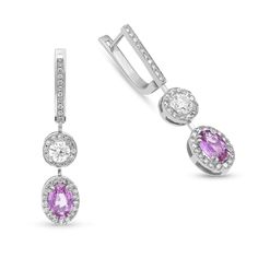 take her breath away with these stunning pink sapphire and diamond drop earrings that are sure to offer incomparable beauty and unmatched quality. Expertly crafted in 18K white and yellow gold, each earring features a feminine oval-shaped pink sapphire surrounded by a white diamond halo topped by a glistening round diamond in a pave-lined halo. Radiant with 2.88ct. t.w. of diamonds and a pop of color, these spectacular drops suspend from diamond-lined post leading into englis Sapphire Drop Earrings, White Sapphire Earrings, Emerald Earrings Drop, Pink Sapphire Earrings, Gem Jewelry, Colour Stone, Orange Sapphire, Colored Gems, Tennis Bracelet Diamond