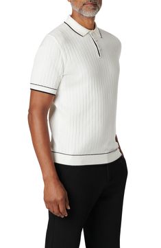 Contrast tipping lends stylish detail to a cotton-forward polo articulated by allover ribbing. 26" length (size Medium) Button half-placket Spread collar Short sleeves 90% cotton, 10% polyamide Machine wash, dry flat Made in Turkey Fitted Cotton Polo Sweater With Ribbed Collar, Fitted Cotton Textured Knit Polo Sweater, White Ribbed Polo Collar Top, White Ribbed Top With Polo Collar, White Collared Polo Sweater With Ribbed Collar, Modern Cotton Polo Sweater With Ribbed Collar, Spring Cotton Polo Sweater With Button Closure, White Cotton Polo Sweater With Ribbed Collar, Classic White Knit Polo Shirt