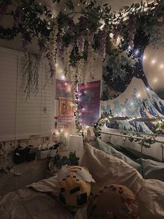 a bedroom decorated with flowers and lights in the ceiling, along with an unmade bed