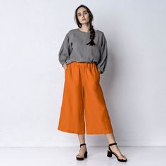 ORLEANS - natural linen culottes is relaxed fit. High elasticated waist for comfort and easy wear, in-seam side pockets for functional day to day experience.  Wear these linen culottes with any of our blouses, linen VIENNA jacket! 100% medium weight stonewashed linen. Model is wearing size S; model's height is 5'7 feet / 170cm  Color in the photo is SWEET MANDARIN. You can choose colour from our Spring/Summer or Autumn/Winter medium weight linen colour palettes. SIZES: XS, S, M, L, XL, XXL   If Pants Festival Outfit, Linen Pants Plus Size, Casual Office Outfit, Smart Casual Office, Linen Culottes, Pants Plus Size, Office Outfit, Plus Size Pants, Casual Office