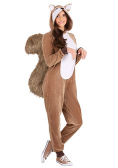 a woman in a costume that is holding a raccoon