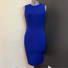 Really Beautiful For Business Or Wedding Never Worn Stretch Pretty Cobalt Color Fitted Blue Bodycon Dress With Back Zipper, Elegant Royal Blue Sleeveless Bodycon Dress, Fitted Blue Dress With Side Zipper, Blue Knee-length Dresses With Side Zipper, Blue Sleeveless Dress With Side Zipper, Blue Workwear Dress With Back Zipper, Blue Dress With Back Zipper For Work, Elegant Blue Calvin Klein Dress, Calvin Klein Blue Evening Dress