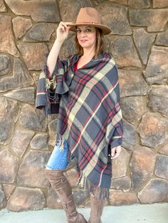 Snuggle up with this cozy plaid button shawl/scarf, and add both function and style to your outfit. Plaid is a classic, timeless choice, yet on-trend for fall. This blanket scarf has real wooden, functional buttons that convert this traditional scarf into a shawl that can be worn in a number of different ways. Button down the middle or to the side. Unbuttoned to wear as a scarf and wrap around your neck. Perfect for the cool nights, a football game, or a bonfire. You will wear this throughout th Plaid Shawl Scarf For Fall, Fall Plaid Shawl Scarf, Plaid Scarves For Fall, Button Shawl, Plaid Shawl, Shawl Scarf, A Football, Blanket Scarf, Football Game