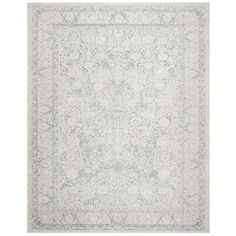 a white rug with an intricate design on the top and bottom, in grey tones