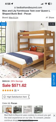 the bed frame is made from wood and has two mattresses on each side,