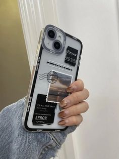 someone holding up their cell phone case to take a selfie with the camera on it