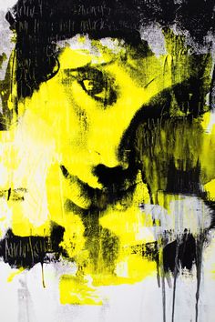 an abstract painting with yellow and black paint on it's face, in the foreground