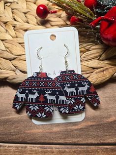 Liven up your holiday look with these talk of the town Ugly Sweater Christmas Earrings! Add a bit of jolly to your outfit when you flaunt these outrageous earrings. Let the seasonal spirit shine through with this cleverly-crafted fun accessory that you won't find anywhere else! Silver French Earring Hooks They are lightweight and easy to wear.  Each earring will have a unique pattern.  Hypoallergenic CARING FOR YOUR JEWELRY: * Please remove earrings before bathing and swimming. Material: Hypoall Sweater Earrings, Earrings Funny, Ugly Sweater Christmas, Funny Earrings, Holiday Earrings, Sweater Christmas, Holiday Earring, Hypoallergenic Earrings, Christmas Earrings