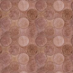 a brown and tan rug with circles on it