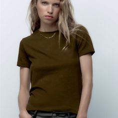 Size Large But Runs Small Trendy Khaki Crew Neck T-shirt, Trendy Khaki Short Sleeve T-shirt, Khaki Crew Neck T-shirt, Everyday Khaki Crew Neck Top, Green Fitted Crew Neck T-shirt, Khaki Crew Neck Tops For Fall, Casual Green Fitted T-shirt, Casual Khaki T-shirt For Fall, Zara Short Sleeve Tops For Fall