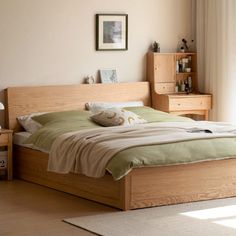 a bed sitting in a bedroom next to a window