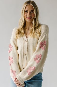 Introducing The Quimby Floral Detail Cardigan in Cream! This cardigan is the perfect mix of comfort and style with its soft cream color and delicate floral details. Layer it over any outfit for a touch of whimsy and warmth. Details self/lining: 78% acrylic + 10% wool + 2% spandex Fabric Care Guide Here Sizing & Fit Measurements are approximate and taken while laying flat across the front. Not doubled. x-small: bust = 19"; length = 21" small: bust = 19.5"; length = 21.5" medium: bust = 20"; lengt Piper And Scoot, Puff Sleeve Sweater, Striped Sweater Dress, Striped Knit Dress, Maxi Dress Pattern, Floral Denim, Cardigan Jacket, Striped Knit, Small Bust