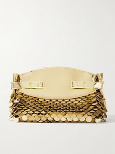 Ferragamo debuted this version of the iconic 'Hug' bag on the Fall '24 runway - the collection is inspired by the glamour of the 1920s. Made from metallic gold leather, this clutch is embellished with rows of paillettes for added sparkle and comes with a crossbody strap so you can go hands-free. Stow your phone, wallet and compact in the spacious interior. Designer Clutch With Gold-tone Hardware For Events, Luxury Evening Bag With Gold-tone Hardware For Gala, Luxury Gold-tone Evening Bag For Gala, Designer Gold Leather Clutch, Luxury Clutch With Gold-tone Hardware, Luxury Clutch With Gold-tone Hardware For Events, Gold Leather Bag For Events, Luxury Rectangular Bags For Fashion Events, Luxury Gold Clutch With Detachable Handle