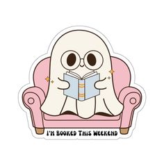 a sticker that says i'm booked this weekend with a ghost reading a book