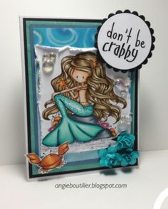 a card with an image of a mermaid