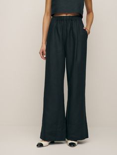 Be a little flexible.  Shop the Petites Fernando Wide Leg Linen Pant from Reformation, a mid rise pant with an elastic waistband and relaxed wide leg. Versatile Wide-leg Bottoms With Relaxed Fit, Versatile Relaxed Fit Wide-leg Pants, Versatile Wide-leg Pants With Relaxed Fit, Chic Workwear Pants With Comfort Waistband, Chic Pants With Comfort Waistband For Work, Versatile Wide Leg Trousers With Pull-on Style, Elevated Casual Bottoms With Relaxed Fit, Relaxed Fit Bottoms For Elevated Casual Wear, Elevated Casual Relaxed Fit Pull-on Bottoms