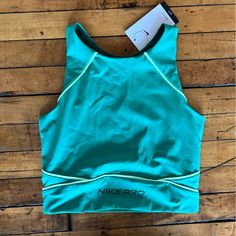 Super Cute, Beautiful Teal Color. Brand New With Tags, Retails For 48$ And Sold Out! #Nike #Athleisure #Y2k #Sportswear #90s #00s Green Cropped Activewear For Sports, Green Cropped Sporty Tank Top, Green Cropped Activewear For Workout, Green Crop Top For Gym, Green Cropped Sporty Tops, Green Sports Crop Top, Green Casual Crop Top For Sports, Casual Crop Top For Training, Casual Training Crop Top