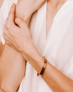 Introducing our 18k Gold Plated Elina Cuff, the first piece in our new cuff range. We love styling Elina with an oversized sweater or stacking it with beaded bracelets for a boho vibe. It’s the perfect everyday staple to match all your favorite outfits. The understated clasp is designed for easy opening and closure. This gorgeous cuff will quickly become your go-to bracelet! Details:  2.5" wide x 2 mm x 5 mm 18k Gold Plated FREE Insured Shipping (Worldwide) Minimalist Accessories, Jewelry Sale, Formal Outfits, Boho Vibe, Oversized Sweater, Flash Sale, Discount Code, Simple Design, Cali