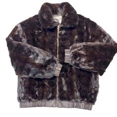 Kashani Men's Chocolate Brown Reversible Leather Mink CoatMaterial: Mink and LeatherStyle: CoatColor: Chocolate Brown Tiger Print Jacket, Chinchilla Fur Coat, Mens Fur Coat, Mink Jacket, Chinchilla Fur, Rabbit Fur Coat, Mens Fur, Shearling Vest, Mink Coat